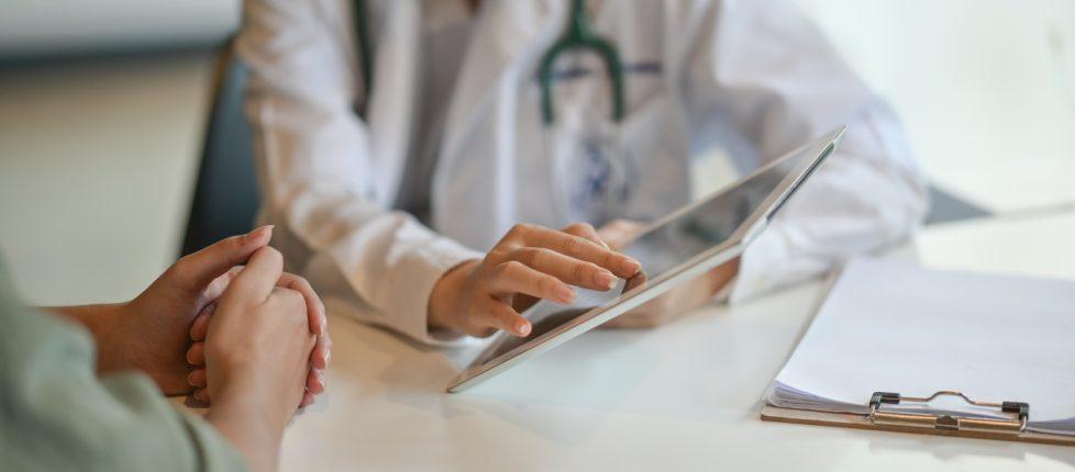 doctor sitting with patient