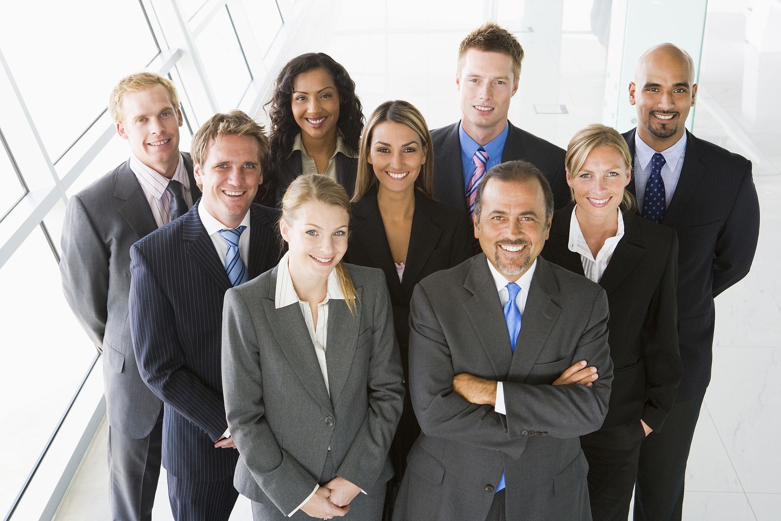 Group picture of the 9 members of the United Credit team.